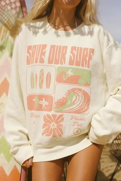 Ride the wave of sustainability with our new Save our Surf Crewneck. Created in collaboration with Save our Surf, each crewneck purchase removes 1lb of plastic from the ocean. Not only were the graphics designed to promote sustainability, but the Save our Surf Crewneck is made from organic cotton and recycled plastic water bottles, so you can feel cozy knowing you’re truly making a splash for cleaner oceans. Surfer Shirts Surf Style, Surf Merch, Surf Fits, Surfing Outfits, Surf Outfit Women, Surf Aesthetic Outfit, Surf Crewneck, Surfing Fashion, Club Poses