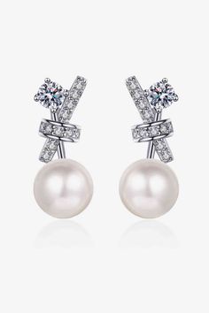 Picture style: Ghost mannequin, studio Features: Pearl, moissanite,each earring has 0.36 ct moissanite, the total is 0.72 ct Material: 925 sterling silver, moissanite, pearl, rhodium-plated, zircon (accent stones) Care: 1. Avoid wearing during exercise, as sweat will react with the jewelry to produce silver chloride and copper sulfide.2. While wearing the pearl necklace, avoid exposure to the sun and contact with highly volatile substances such as perfume and hairspray, as it will easily fade in Gifts For Her Ideas, Ghost Mannequin, Rhinestone Material, Silver Pearl Earrings, Pearl And Diamond Earrings, Picture Style, Knot Earrings, Moissanite Jewelry, Bow Earrings