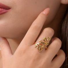 This exquisite 14 Gold Plated Silver floral Ring for Women is a stunning piece that effortlessly combines elegance and sophistication. Crafted with meticulous attention to detail, this ring showcases a beautiful blend of silver and gold, creating a captivating contrast that will instantly catch the eye. The gold adds a touch of luxury and brilliance to the overall design, making it the perfect accessory for any occasion. Designed especially for women, this ring features a sleek and feminine silh Elegant Gold Flower Ring For Wedding, Elegant Gold Flower Ring, Elegant Yellow Gold Flower Ring For Anniversary, Elegant Flower Ring For Formal Occasions, Elegant Yellow Gold Flower Ring For Wedding, Elegant Yellow Gold Wedding Flower Ring, Elegant Gold Open Band Jewelry, Elegant Gold-plated Flower Ring, Elegant Hallmarked Yellow Gold Flower Ring