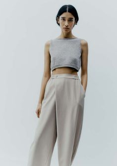 Timeless modernity pants designed to use them all year round. made from the greatest soft and light fabric. they have elasticated waistband on the back high rise and curved and cropped leg finished with side pockets and detailed with front pareo.    50% wv 55% upcycled pv Pareo Pants, Black Strappy Sandals, Summer 22, Blazer Shirt, Looks Street Style, Sustainable Fashion Brands, Long Knit, Linen Blazer, Black Cardigan