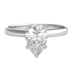 a white gold engagement ring with a pear shaped diamond