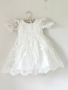 A timeless heirloom, our gorgeously made vintage inspired gown is perfect for your little's special event. Featuring delicate lace, made perfect with a cotton/linen liner to ensure comfort. This is a complete set consisting of the gown and coordinating bonnet. Lace Princess Dress With Ruffles For First Communion, Elegant Baptism Princess Dress With Lace Trim, Fitted Cream Princess Dress For First Communion, Cream Fitted Princess Dress For First Communion, Elegant Princess Dress With Lace Trim For Baptism, Elegant Fitted Princess Dress For Garden Party, Fitted Cream Princess Baptism Dress, Elegant Baptism Princess Dress With Lace Bodice, Cream Fitted Princess Dress For Baptism