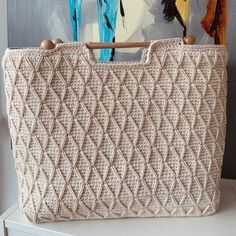 This crochet beach bag is totally handmade and it is my own design.  It looks very stylish with its wooden handle and is very easy to carry. It is a very useful bag for daily and beach. Very stylish with wooden handles and big enough for your items. Makes a great gift obtion for mothers day, valentines day or birthday...  Cotten tote bag with wooden handle... Size: 35*47*10 cm (14*18*4 inc) Summer Bags Crochet, Cotton Beach Bag, Summer Bags Beach, Shoping Bag, Crochet Flats, Crochet Beach Bags, Teacher Bag, Aesthetic Tote Bag, Large Beach Bags