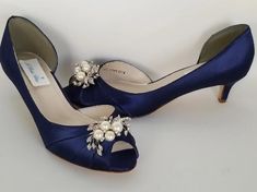 Shoes fit for a princess! Elegant peep toe Navy Blue Bridal Shoes are adorned with pearls and crystals. These Navy Blue Wedding Shoes have a comfortable kitten heel so you can wear them all night long. Designed in the USA. Shop your bridal accessories here! Wide width shoes and dyeable shoes available. Wedding Guest Heels, Spring Wedding Outfit, Navy Blue Wedding Shoes, Non Traditional Wedding Rings, Navy Blue Wedges, Blue Bridal Shoes, Navy Wedding Shoes, Cascade Design, Navy Blue Bridesmaids