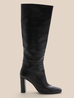 Soft and luxurious, these suede knee-high boots are handcrafted by a team of skilled artisans.  These suede 'Antonella' boots by Alexandre Birman have a slouchy silhouette and slender, yet sturdy block heels.  Suede uppers.  Leather lining.  Side zip Chic High Heel Knee-high Boots With Leather Lining, Chic Knee-high High Heel Boots With Leather Lining, Chic Leather Knee-high Boots With Stacked Heel, Evening Knee-high Boots With Leather Lining, Chic Knee-high Boots With Leather Lining For Fall, Knee-high Boots With Padded Block Heel For Work, Workwear Knee-high Boots With Padded Block Heel, Elegant Knee-length Calf Leather Boots, Calf Leather Knee-high Boots With Almond Toe For Winter