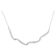 Curved lines add a graceful sense of movement to this exquisite luxury necklace. Crafted from 14K White Gold, this necklace features a 16 chain and comes to life thanks to inset Diamond accents totaling 1.25 carats.This jewelry piece is offered in brand new condition and includes a gift box. Luxury Necklace, Curved Lines, Jewelry Pieces, Diamond Necklace, Jewelry Necklaces, White Gold, Chain, Gold, Gifts