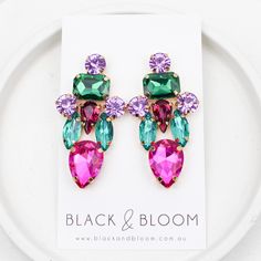 Metal: Brass 18K Gold Plated Pink, purple & green glass crystals Measurements: 5.2cm x 2.8cm Weight: 11g Purple Jeweled Earrings As Gift, Purple Jeweled Earrings For Gift, Green Jeweled Crystal Earrings Gift, Purple Crystal Jeweled Earrings, Purple Jeweled Crystal Earrings, Green Crystals, Purple Green, Gold Details, Green Glass