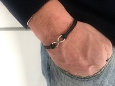 "Infinity  men bracelet, mens gift, minimalist bracelet for boy, for child, for boyfriend, simplistic. Personalized men bracelet Custom colors and sizes bracelet. Magnetic clasp, hypoallergenic. Very fashion and stylish  For other infinity bracelet :  https://www.etsy.com/it/listing/544457603/infinity-men-bracelet-cotton-cord?ref=shop_home_active_2 https://www.etsy.com/it/listing/530607904/inifinity-uomini-braccialetto-bracciale?ref=shop_home_active_3 for other nice solutions take a look to \"gi Minimalist Black Leather Bracelet As Gift, Minimalist Black Leather Bracelet Gift, Minimalist Black Band Leather Bracelet As Gift, Simple Black Bracelet For Gift, Simple Black Bracelets As Gift, Simple Black Bracelets For Gift, Simple Black Bracelets For Gifts, Black Infinity Bracelet For Friendship, Black Infinity Friendship Bracelet