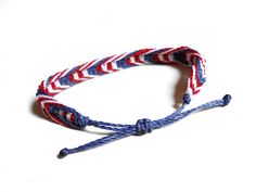 "Join my mailing list for discounts, sales and announcements! Go to: http://eepurl.com/gWZfVH and get an instant 15% discount coupon code. USA flag bracelet made of brazilian wax cord with the colors of the american flag. Wax cord makes this patriotic bracelet very durable. You can even shower or swim with it on and colors barely wash out. Since the USA bracelet is adjustable with a slipknot, it is easily taken on and off. Sizes (adjustable through a slipknot): - S - 13 cm (5.1''). The bracelet Patriotic Red Friendship Bracelet As Gift, White Bracelets For Independence Day Gift, Independence Day White Bracelets Gift, Blue Patriotic Bracelet For Friendship, Patriotic Bracelets For 4th Of July Gift, Patriotic Blue Friendship Bracelets As Gift, Patriotic Blue Friendship Bracelets, Patriotic White Friendship Bracelets As Gift, Blue Friendship Bracelets For 4th Of July Gift