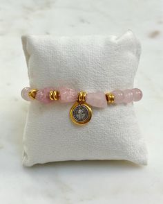 ✨This Saint Benedict Stretch Bracelets is made of following: Size and Material: - 8mm rose quartz stone beads bracelet and gold spacer beads, all strung on a durable elastic band - In the center is a 0.5-inch reversible St. Benedict silver and gold-finish medal. - The bracelet is approximately 7 inches in length - includes a 6mm gold beads stretch bracelet 💫Experience spiritual protection with our Saint Benedict medal bracelet, guarding against temptation. Get yours soon!  💝 Ready to Gift: This bracelet arrives in a beautiful gift box, just like the one pictured! 🌸 Jewelry Care: - Roll bracelets on and off gently to maintain their shape. - Apply cosmetics, lotions, and perfumes before wearing your jewelry. - Remove jewelry before swimming, bathing, exercising, gardening, and sleeping. - Rose Gold Bracelets With 8mm Beads For Gift, Rose Gold 8mm Beads Bracelet For Gift, Rose Gold 8mm Beads Bracelet As Gift, Spiritual Rose Gold Beaded Bracelets Gift, Spiritual Rose Gold Rosary Bracelet Gift, Spiritual Gold Beaded Rose Quartz Bracelets, Spiritual Rose Gold Bracelets With 8mm Beads, Spiritual Rose Gold Bracelet With 8mm Beads, Pink Spiritual Bracelet For Mother's Day