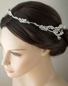 the headpiece is adorned with crystal beads