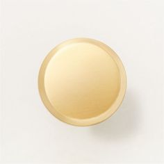 an image of a gold knob on a white background