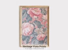 an antique floral print hangs on the wall