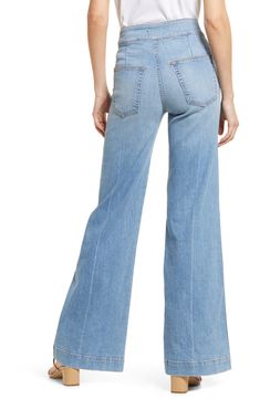 Far-out fashion, in all its groovy glory, comes through in these '70s-inspired jeans cut from Japanese denim with the widest legs we've seen this season. 33" inseam; 24" leg opening; 12" front rise; 14" back rise (size 25) 98% cotton, 2% polyurethane Machine wash, line dry Made in the USA 70s Inspired Wide Leg Flare Jeans For Fall, Retro Denim Flares For Spring, 70s Inspired Wide Leg Jeans For Spring, Spring Retro Denim Flares, Spring Medium Wash Retro Flares, Spring Retro Medium Wash Flares, Spring Retro Mid-rise Flares, 70s Inspired Denim Jeans For Spring, 70s Inspired Spring Denim Jeans