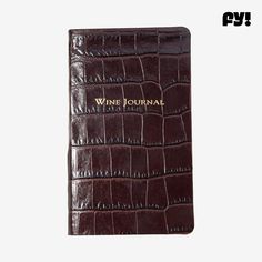 a wine journal with the words wine journal written on it's front and side