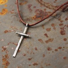 "Take up your cross" pendant is a daily reminder that Jesus said, "Whoever wants to be my disciple must deny themselves and take up their cross daily and follow me."  This piece has a hand hewn look with three tiny nail heads on the cross.  It is approximately 1 3/4" long by 5/8" wide. This pendant comes standard (as pictured) on self adjusting red/brown leather.Solid Sterling Silver Jewelry, Unique Christian, Handmade in Texas by artist Shandon Camarillo-Whitson Take Up Your Cross, Precious Metal Clay Jewelry, Mens Cross Necklace, Logo Jewelry, Fish Jewelry, Faith Jewelry, Metal Clay Jewelry, Silver Jewelry Design, Christian Jewelry