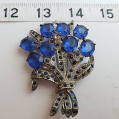 1930s/40s Beautiful Brooch - Art Deco Era  - Blue & Crystal Rhinestone  - Large Pot Metal  - Floral - Good condition Blue Art Deco Formal Brooch, Art Deco Blue Brooches As Gifts, Art Deco Blue Brooches For Gifts, Vintage Sapphire Brooches For Gifts, Vintage Sapphire Brooches As Gift, Mid-century Blue Brooches For Gifts, Blue Vintage Brooch For Party, Vintage Blue Brooches With Rhinestones, Antique Blue Brooches For Anniversary