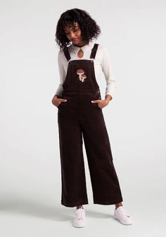 If you love 70’s-inspired silhouettes, corduroy, AND beautifully embroidered mushroom motifs, then these chocolate brown overalls are right up your alley! Made from a soft and stretchy cotton corduroy, this adorable pair of overalls boast red-capped mushrooms embroidered at the front bib pocket, adjustable shoulder straps with a criss-cross design at the back, button closure at the fitted side waist, handy front and back pockets, and a full-length, straight leg finish. Mushroom In Overalls, Brown Courderoy Overalls, Black Curdory Overalls, High Waist Non-stretch Cheap Overalls, Plaid Overall Dress Corduroy, Madewell Corduroy Overalls, Corduroy Jumper Dress Plus, Non-stretch High Waist Overalls, Plus Size Corduroy Jumper