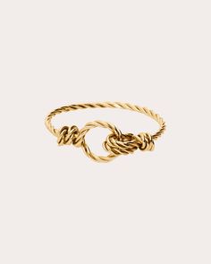 Designed to symbolize attachment to one another, this interlocked ring is handcrafted from twisted 14-karat gold-filled wire. From Atelier Paulin's Original Collection. 14k yellow gold-filled base metal Polish with soft cloth Made in France Measurements Wire thickness: 1mm Twisted Yellow Gold Jewelry For Anniversary, Elegant 14k Gold Twisted Ring, Modern Twist 14k Gold Jewelry, Twisted Yellow Gold Ring As Gift, Twisted 14k Yellow Gold Rings, Twisted Yellow Gold Ring For Gift, Modern Twist Yellow Gold Jewelry With Ring Detail, Yellow Gold Twisted Ring For Gift, Modern 14k Gold Jewelry With Ring Detail