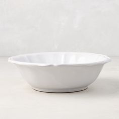 a white bowl sitting on top of a table