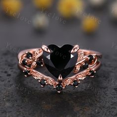 8 mm Heart Shape Black Onyx Ring,Vintage Twig Vine Leaf Ring,Antique Black Onyx Bridal Promise Ring Set Nature Inspired 14K Rose Gold band,Customized,Gift For Her,Christmas Ring gift,wedding gift Material:925 Sterling Silver,Black/Rose/White/Yellow Gold Plated             Solid gold (10k 14k 18k black gold, rose gold,yellow gold,white gold,Platinum available) Main stone:8mm heart cut natural black onyx stone Stones: Natural round cut Black spinel stone Band width:approx 1.5 Setting:prongs  set Matching band: Stone:with Natural round cut Black spinel stone Band width:approx 1.3 Setting:prongs set Our Service: All sizes available,please feel free to contact me if you need another ring sizes. Craft Period:Because all of rings are handmade to orders,it takes about 13-15 business days to make ( Rose Gold Black Ring, Onyx Promise Ring, Black And Gold Rings Women, Black And Pink Wedding Rings, Goth Wedding Ring Set, Halloween Wedding Rings, Black Heart Cut Jewelry For Wedding, Antique Black Jewelry For Wedding, Antique Black Wedding Jewelry