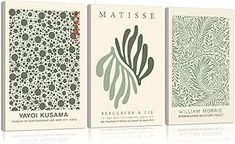 three books with different designs on them, one in green and the other in white