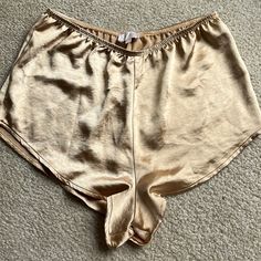 Never Worn Gold Satin Pj/Lingerie Shorts! Fitted Bottoms For Pajama Party, Fitted Short Bottoms For Pajama Party, Gold Stretch Bottoms Short Length, Solid Color Brief Shorts For Loungewear, Fitted Shorts For Pajama Party, Gold Stretch Short Bottoms, Stretch Short Bottoms For Pajama Party, Summer Brief Pajama Shorts For Loungewear, Lingerie Shorts