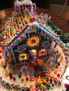 a decorated gingerbread house with candy and candies