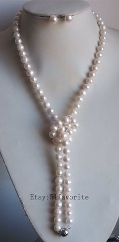 Jewelry: fresh water pear, genuine cultured pearl Color: white Grade: AA+, have natural blemish and thread as photos, photos taken in kind Size: 9-10mm Length: offer 16,17,18,19,20, 33, 48, 64, 80, 96 inch, photos shows is 33 inch! 48 inch, 64 inch, 80 inch and 96 inch can finish without clasp. If you need clasp. Please contact me. Other length please contact me. Handwork: knotted between every 2 pearl bead Metal: alloy Shipping: I will send out your order in 1-2 business days. Usually will take Classic White Pear-shaped Jewelry, Classic Pear-shaped White Jewelry, White Teardrop Akoya Pearl Necklace, White Pear-shaped Akoya Pearl Necklace, Pearl White Akoya Pearl Drop Jewelry, Adjustable White Akoya Pearl Necklace, White Drop Pearl Necklace As Gift, White Drop Pearl Necklace Gift, White Drop Pearl Necklace For Gift