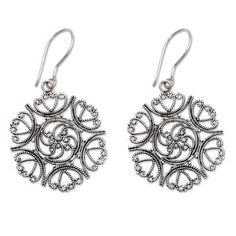 Encircled by hearts roses bloom with sterling silver splendor. Bali's Komang Wijayana presents these elegant handcrafted earrings. .925 Sterling silver Elegant Round Nickel-free Flower Earrings, Elegant Round Sterling Silver Flower Earrings, Classic Silver Flower Earrings For Gift, Silver Sterling Flower Earrings, Silver Sterling Silver Round Flower Earrings, Pierced Round Sterling Silver Flower Earrings, Classic Silver Round Flower Earrings, Silver Flower Earrings For Formal Occasions, Silver Pierced Flower Earrings For Formal Occasions