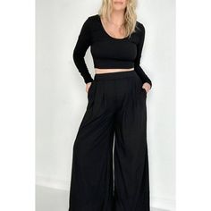 Black Chic Ribbed Crop Top And Wide Leg Pants Set In Black. Perfect For A Date Night! Size L (10-12) Product Measurements (Inch): L: Bust 35.4, Hip 49.6, Sleeve Length 24, Length 16.1, Inseam 30.8, Thigh 31.3, Hem Width 30.3, Waist 30.3, Outseam 41.7 * Color: Black * Style: Sexy * Fit: Fitted Top, Relaxed Bottoms * Pattern Type: Plain * Neckline: Round * Waist Line: High * Sleeve Length: Long Sleeve * Body: Not Lined * Sheer: No * Size Type: Standard * Pants Fit: Baggy * Stretch: Medium Stretch Black Cropped Bottoms For Spring, Cropped Black Bottoms With Pockets, Black Cropped Bottoms With Pockets, Versatile Cropped Bottoms For Loungewear, Black Cropped Pants For Spring, Casual Cropped Black Bottoms, Solid Cropped Bottoms For Night Out, Cropped Black Pants For Work, Casual Cropped Pants For Night Out