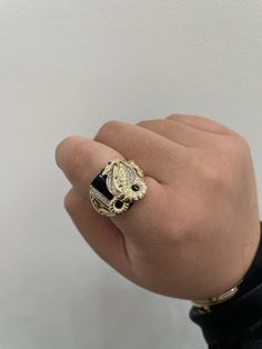 14K Onyx Snake and Eagle CZ Ring  -Solid 14K REAL Gold !! -Very nice Snake and Eagle Onyx ring with red eye cz  -The design includes cz stones  -Great gift for both male and female!! -Available in a size 10 US  -(message us if you have any other questions) -item sold by piece. Weight undetermined. - Once rings are personalized to a specific size it is final sale. Luxury Gold Plated Rings With Diamond Accents, Round Cubic Zirconia Ring With Diamond Eyes, Luxury Cubic Zirconia Ring With Polished Finish, Luxury Anniversary Rings With Diamond Eyes, Diamond Jewelry With Diamond Eyes For Promise Ring, Luxury Diamond Eyes Rings For Anniversary, Luxury Snake Ring With Diamond Accents As Gift, Luxury Collectible Cubic Zirconia Jewelry, Luxury Snake Ring With 17 Jewels For Gift