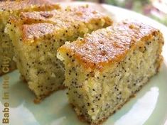 two pieces of cake sitting on top of a white plate