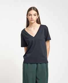 Supima Double V Neck Tee Cotton Relaxed Fit V-neck Top For Loungewear, Relaxed Fit Cotton V-neck Top For Loungewear, Classic Oversized V-neck Top, Casual Everyday Cotton V-neck Top, Relaxed Fit V-neck T-shirt For Work, Minimalist Relaxed Fit Tops For Loungewear, Modern Relaxed Fit V-neck Top, Effortless V-neck Top For Daywear, Versatile Cotton V-neck Tops