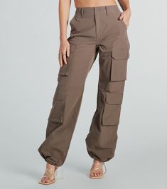 Achieve stylish functionality with these high-rise cargo straight-leg pants. Crafted from lightweight and breathable woven fabric, they feature side pockets and lower flap cargo pockets, and an adjustable drawcord hem so you customize the style. Complete the look in a basic crop top for a day out! Fit & Features High-rise waist Front button and hidden zipper closure Side pockets, faux back flap pockets Lower cargo flap pockets Straight-leg silhouette, adjustable drawcord hem Lightweight woven fabric, no stretch Runs true to size | Windsor Out For The Day High-Rise Cargo Pants in Brown | Size: Small | Woven Fabric Free Shipping on All Orders Over $75. Utility High-waisted Cargo Pants, Utility Parachute Pants With Flap Pockets, High-waisted Utility Cargo Pants, High-waisted Utility Cargo Pants With Multiple Pockets, Utility Parachute Pants With Functional Pockets, Utility Parachute Pants With Functional Pockets For Workwear, Utility Nylon Cargo Pants, Utility Nylon Bottoms With Cargo Pockets, Wide Leg Nylon Cargo Pants For Workwear