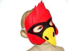 This CARDINAL mask is designed for everyday fun, great for dress up and pretend play, ideal gift, perfect for themed birthday parties, party favor and photo props. Up for sale two-layers, all stitched (no glue), high quality mask made of soft eco felt, held firmly in place with elastic, recommended for children 3 years old and up. *Please, convo if you need a package of 10 or more mask to receive a discount.* All Sales are final! Insurance is available upon request at the BUYER'S expense. For mo Themed Carnival Costume Accessories Mask, Novelty Mask For Masquerade Carnival, Novelty Masks For Carnival Costume Party, Novelty Carnival Mask Costume Accessory, Themed Red Costume Accessories For Gift, Themed Red Costume Accessories As Gift, Red Themed Costume Accessories For Gifts, Red Themed Costume Accessories For Gift, Novelty Carnival Mask