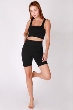 NIKIBIKI Black Cropped Ribbed Tank at Boho Pink Fitted Ribbed Tank Sports Bra, Seamless Stretch Crop Top With Square Neck, Seamless Stretch Square Neck Crop Top, Fitted Ribbed Crop Top With Square Neck, Ribbed Fitted Crop Top With Square Neck, Fitted Ribbed Square Neck Crop Top, Square Neck Ribbed Fitted Crop Top, Stretch Crop Top With Square Neck, Stretch Square Neck Crop Top