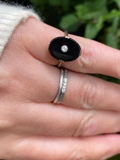 ~ Here we have a beautiful early 20th century ring set with a black onyx and diamond  ~ In great condition, light wear and patina in keeping with age and use. The main stone tests as black onyx, no chips or damage, set with a diamond, secure in bezel, nice and bright.  ~ Size measures as a U.K. K / US around 5.12  ~ Ring face is approximately 16.1mm north to south ~ Ring is unmarked as often seen in older pieces, tests as gold of 14ct  ~ Any questions or for more photos please feel free to messa Vintage Black Oval Engraved Ring, Vintage Black Enamel Round Ring, Vintage Black Engraved Round Ring, Classic Enamel Ring With Gemstone, Black Oval Engraved Hallmarked Ring, Timeless Black Ring With Rose Cut Diamonds, Timeless Black Rings With Rose Cut Diamonds, Antique Black Rings With Rose Cut Diamonds, Antique Black Round Signet Ring