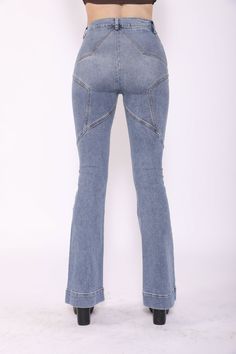 DESCRIPTION With premium fabric and careful hand stitched design we created jeans that are absolutely out of this world. The most authentic recreation of the iconic star jeans of the 70s. These jeans are super high waisted and fitted. Made to hug your hips and accentuate your curves. + DETAILS - 35" inseam- 22" Flare Opening- High Waisted- Stitched Star on Butt Detail- Front Pleat- If you're under 5'4, these work best with a platform, or heel + VIDEO + FABRIC - High Quality Cone Mills Fabric- Co Mid-rise Flare Jeans With Contrast Stitching In Medium Wash, High Waist Jeans With Contrast Stitching, High Waist Rigid Denim Jeans With Contrast Stitching, Fitted Dark Wash Flare Jeans With Contrast Stitching, High Rise Denim Blue Flare Jeans With Contrast Stitching, Fitted Flare Jeans With Contrast Stitching, High Waist Fitted Flare Jeans In Rigid Denim, Fitted Dark Wash Flare Jeans In Rigid Denim, Fitted Rigid Denim Flare Jeans In Dark Wash