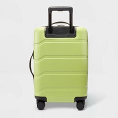 For convenient packing and traveling, pick this Hardside Carry-On Suitcase from Open Story™. Featuring a full zip-around closure, this lime green hardside suitcase is expandable to offer you extra space for additional stuff. The interior features multiple compartments and cross straps plus full lining. Designed with eight wheels, this hardside carry-on suitcase features a retractable handle for easy storage and holds up to 100 pounds. Open Story™: Every journey inspires a new chapter. Green Travel Accessories With Luggage Sleeve, Green Rectangular Luggage With Zipper Closure, Functional Green Travel Luggage, Functional Green Luggage For Trip, Green Travel Accessories With Zipper Closure, Green Travel Luggage With Zipper Closure, Green Luggage With Zipper Closure For Travel, Modern Green Travel Luggage, Rectangular Green Travel Accessories