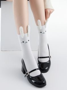 Get ready to hop into style with our adorable bunny cotton socks! Available in both black and white, these spring and summer short socks are the perfect way to add a touch of kawaii charm to any outfit.  Each set includes a pair of these irresistibly cute bunny socks, made from soft and breathable cotton for all-day comfort.  Whether you're lounging at home or heading out for a fun day, these bunny socks are sure to bring a smile to your face with their playful design. Step into cuteness and com Playful White Socks For Spring, Trendy White Socks For Spring, White Casual Knee-high Socks For Spring, Casual White Knee-high Socks For Spring, Cute Black Socks For Spring, Cute Black Spring Socks, White Harajuku Socks For Winter, Harajuku Black Socks For Spring, Black Harajuku Socks For Spring