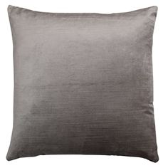 a gray pillow on a white background