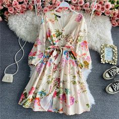 Name: bubble sleeves, V-neck dress, fashion, temperament breasted A-line dressMaterial:blendedColor:as pictureFeatures: floral,printed,sweet,fashionSize(cm):M.L,XL,2XL 1inch=2.54cmM:sleeve:53,bust:84-85,length:94L:sleeve:54,bust:88-89,length:95&ltbr/>&ltp&gtXL:sleeve:55,bust:92-93,length:96</p>&ltbr/>&ltp&gt2XL:sleeve:56,bust:96-97,length:97</p>&ltbr/>&ltp&gtNote:Due to different measurement methods,there will be 1-3 error(unite:cm), pleas Elegant Floral Puff Sleeve Dress For Brunch, Elegant Printed V-neck Floral Dress, Chic Floral Print Midi Dress With Lantern Sleeves, Chic Midi Dress With Floral Print And Lantern Sleeves, Floral Print Lantern Sleeve Dress For Garden Party, Flowy Floral Print V-neck Knee-length Dress, Flowy Floral Print Knee-length V-neck Dress, Lantern Sleeve Floral Print Dress For Garden Party, Flowy Knee-length V-neck Floral Dress