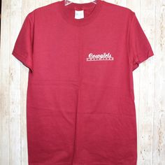 Women's T-Shirt Burgundy Western Cowboy Horse Rodeo Short Sleeve T-Shirt Tag - Port And Company Front Chest Logo - Cowgirls Unlimited Back Saying - Cowboys Are Like Fine Wine 100% Preshrunk Cotton Small (S) Nwt New With Tags Great Condition Tops156pm20 Casual Burgundy Short Sleeve Shirt, Casual Heather Maroon Cotton Top, Burgundy Cotton Short Sleeve Tops, Heather Maroon Crew Neck Cotton Top, Burgundy Cotton Crew Neck Top, Red Short Sleeve Americana T-shirt, Casual Burgundy Short Sleeve T-shirt, Red Americana Short Sleeve T-shirt, Horse Rodeo