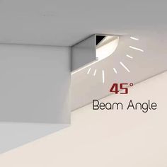 a clock with the words beam angle on it's face in front of a white wall