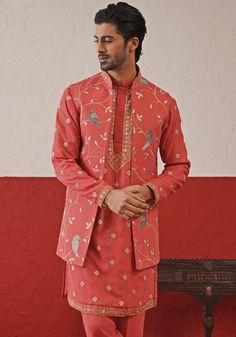 Radiate warmth in stunning Red Embroidered Jacket Kurta. Crafted from luxurious georgette, the front open jacket features resham and sequinned embroidery work. Teamed with a yoke design kurta adorned with all-over motifs. Completed with matching trousers and pure lining for ultimate comfort. Perfect for Sangeet, Mehendi, or as a wedding guest outfit. Composition : Jacket, Kurta & Trouser : Viscose Georgette Care: Dry Clean Only and Vacuum Storage This product can be customized for sleeves, lengt Festive Nehru Jacket With Floral Embroidery Traditional Drape, Nehru Jacket With Floral Embroidery For Reception And Festivals, Floral Embroidered Nehru Jacket For Reception And Festivals, Floral Embroidered Nehru Jacket For Festivals And Receptions, Festival Nehru Jacket With Floral Embroidery For Reception, Traditional Drape Outerwear With Zari Work For Reception, Embroidered Nehru Jacket For Reception, Straight Shape, Embroidered Nehru Jacket For Reception, Long Sleeve Nehru Jacket With Intricate Embroidery For Reception