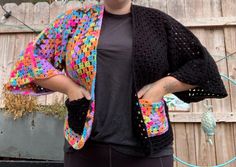 For those that want a splash of color with their all-black aesthetic. This is a ready made item. Not taking blind commission at this time, but feel free to message me if you want something more custom. Sweater will be baggier for smaller sizes. Model is 5'10", curvy, generally wears between xl and xxl, and I hate my picture taken. Black Cotton Cardigan With Pockets, Handmade Black Outerwear For Spring, Handmade Black Casual Cardigan, Handmade Casual Black Cardigan, Black Handmade Casual Cardigan, Casual Black Handmade Cardigan, Casual Handmade Black Outerwear, Cardigan With Pockets, Ready Made