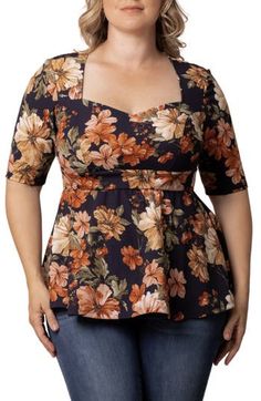 This versatile top is framed by elbow-length sleeves and features a flouncy peplum that moves when you walk. 27 1/2" (size 1X) Sweetheart neck Elbow-length sleeves 95% polyester, 5% spandex Machine wash, dry flat Made in the USA of imported fabric Fall Floral Print Button-up Blouse, Spring V-neck Peplum Top With Ruffle Hem, Summer V-neck Peplum Top With Ruffle Hem, Feminine V-neck Peplum Top, Floral Print Rayon Button-up Blouse, Elbow Length Sleeve, Sweetheart Neck, Autumn Garden, Peplum Top