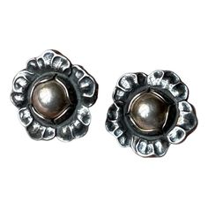 A set of 'Year' clip earrings by Georg Jensen. Based upon a design from circa 1900 these were relaunched in 2002. Floral design with silver-beads. Original box. Fully hallmarked. Measurements: 19x19x10 mm. Weight: approx 10 grams combined. This piece has an attribution mark,   I am sure that it is completely authentic and  take full responsibility for any authenticity   issues arising from misattribution Sustainable Gifts, Georg Jensen, Flower Clip, Accessories Jewelry Earrings, Clip Earrings, A Design, Sterling Earrings, Silver Beads, Clip On Earrings