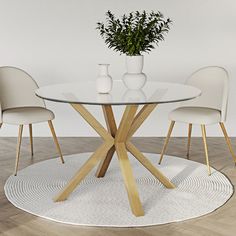 a round glass table with white chairs and a plant in the vase on top of it